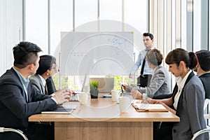 Businesspeople discussing together in conference room during meeting at office