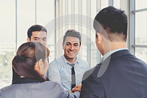 Businesspeople discussing together in conference room during meeting at office