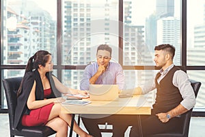 Businesspeople discussing together in conference room during meeting at office