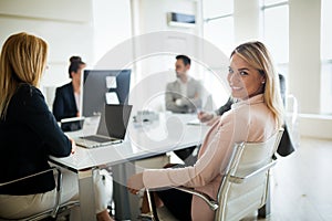 Businesspeople discussing together in conference room during meeting at office