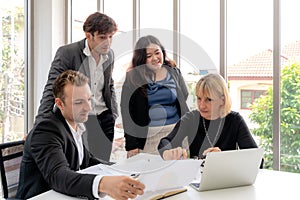 Businesspeople discussing together in conference room during meeting at office