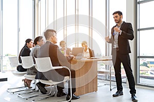 Businesspeople discussing together in conference room during meeting at office