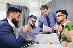 Businesspeople discussing together in conference room during meeting at office