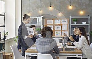 Businesspeople discussing together in conference room during meeting at office