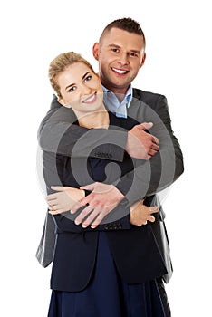 Businesspeople embracing each other