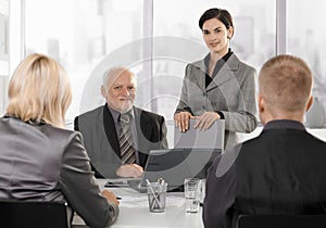 Businesspeople at formal meeting