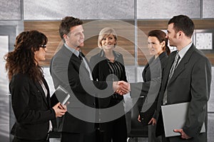 Businesspeople greeting each other