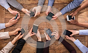 Businesspeople Hand Using Mobile Phone