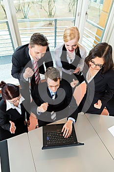 Businesspeople have team meeting in office