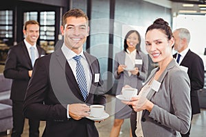 Businesspeople having a discussion during break time