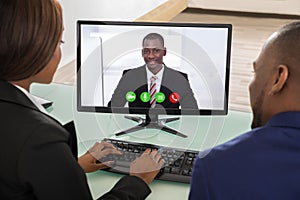 Businesspeople Having Videoconference