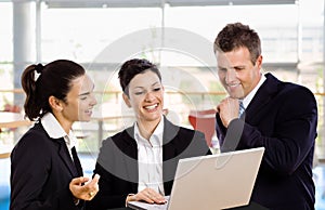 Businesspeople with laptop