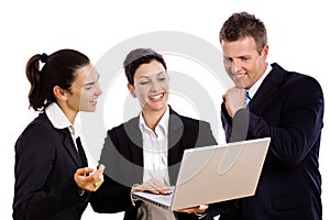 Businesspeople looking at laptop