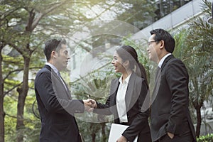 Businesspeople making handshake agreement. concept partner