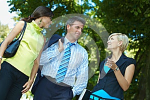 Businesspeople in park