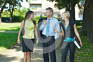 Businesspeople in park