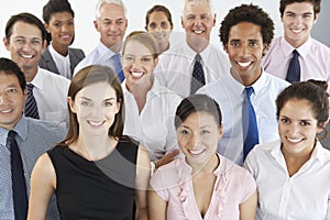 Businesspeople Seated In Circle At Company Seminar