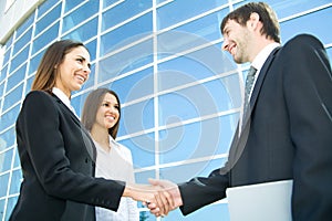 Businesspeople shake hands