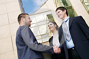 Businesspeople shake hands