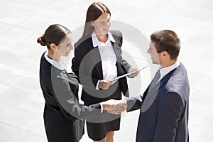 Businesspeople shake hands