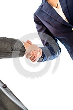 Businesspeople shaking hands to close a business deal