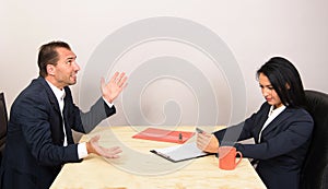 Businesspeople sitting at table