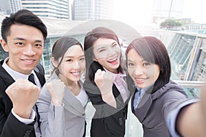 Businesspeople smile happily in hongkong