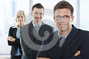 Businesspeople smiling at camera