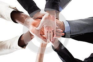 Businesspeople Stacking Hands