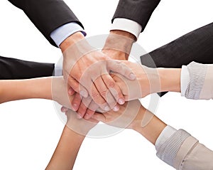 Businesspeople stacking their hands together