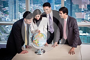 Businesspeople talk about global strategy