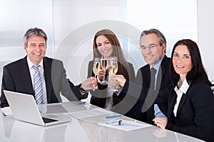 Businesspeople Toasting Champagne