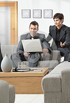 Businesspeople working on computer