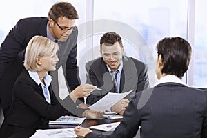 Businesspeople working in office