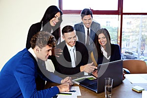 Businesspeople working in the office together