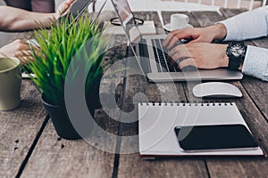 Businesspeople working on their computers photo