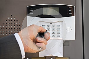 Businessperson Hand Operating Security System