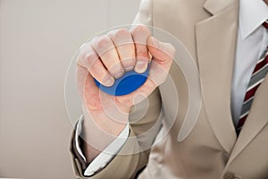 Businessperson hand with stressball