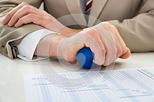 Businessperson hand with stressball