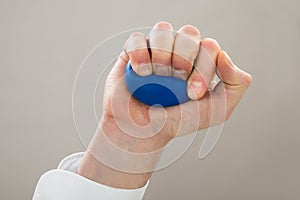 Businessperson hand with stressball