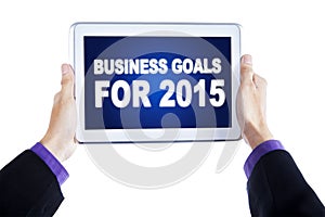 Businessperson hands with business goals for 2015