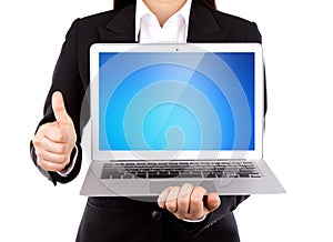 Businessperson holding an open laptop with thumb up