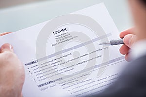 Businessperson holding resume