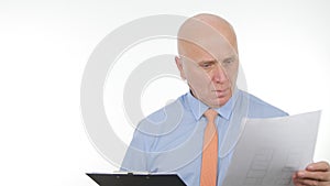 Businessperson Reading Financial Information from a Document