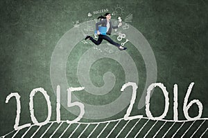 Businessperson running to achieve numbers 2016
