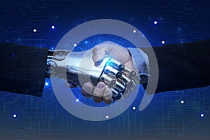 Businessperson shaking hand with digital partner over futuristic background. Artificial intelligence and machine learning process