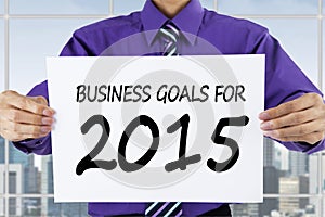 Businessperson showing business goals for 2015