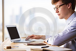 Businessperson using laptop