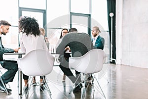 Team of people work together in office. Concept of teamwork and partnership