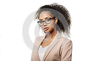 Businesswoman. African American Woman in business or teacher on a white background. Girl in a strict suit and glasses